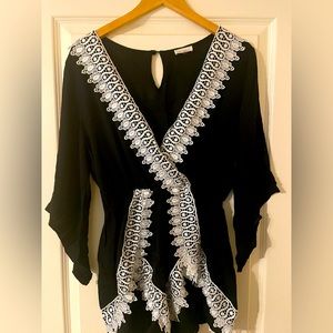 Beautiful Black & White Lace Romper.
